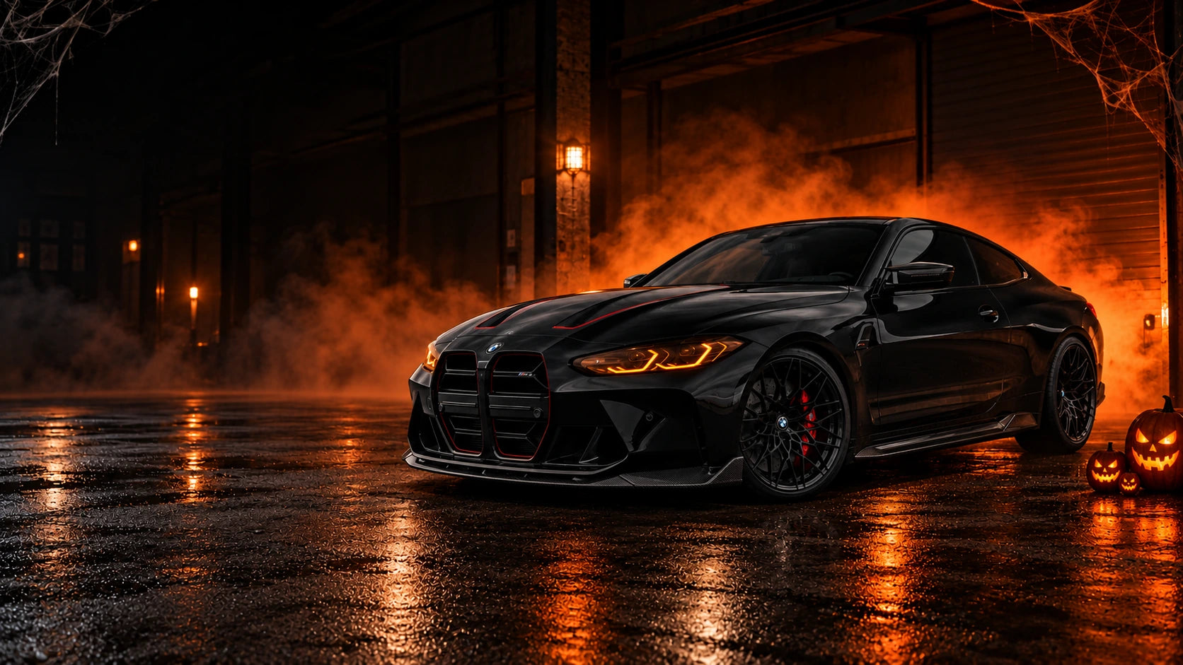 Black BMW M4 in a dark garage with orange Halloween lighting